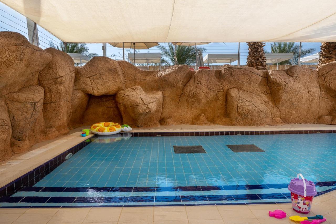 Vert Hotel Eilat By Afi Hotels Exterior foto The swimming pool at the Dead Sea Spa Magdala